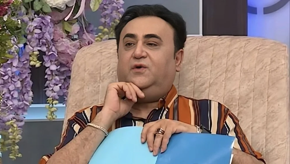 Elgiz Xalq artistinin paltarında efirə çıxdı